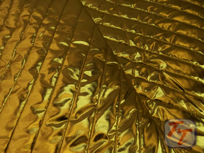 Capitonado licra | rayas oro